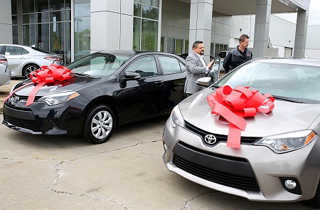 Gulf States Toyota Workforce Development Manager Robert Trevino, at left, and East Mississippi Community College Automotive Technology Program lead instructor Dale Henry look over two Toyota Corollas Carl Hogan Toyota in Columbus donated to EMCC.